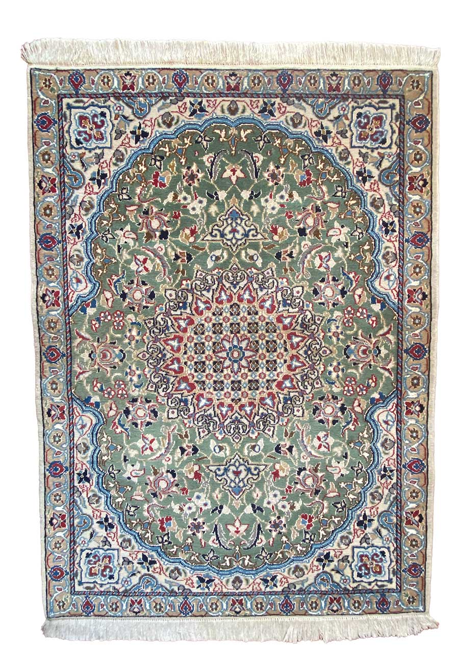 Un tappeto verde e blu su fondo bianco, noto anche come Tappeto Nain.