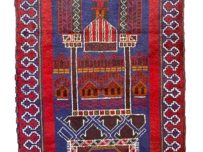 Un tappeto Tappeto Baluci con un disegno rosso, blu e bianco.