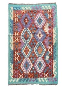 Galleria Tabriz - Tappeti in vendita. Tappeto Bozza automatica con motivo geometrico colorato e bordo verde acqua, caratterizzato da forme dinamiche a forma di diamante in vivaci tonalità di rosso, arancione, blu e viola.