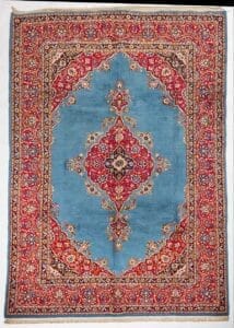 Galleria Tabriz - Tappeti in vendita. Tappeto Kashan persiano ornato con centro blu, medaglione rosso e oro e intricati motivi floreali sul bordo.