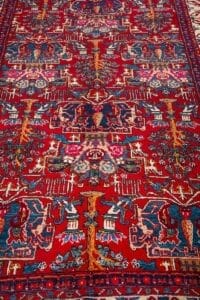 Galleria Tabriz - Tappeti in vendita. Tappeto persiano Tappeto Heriz, colorato e intricato, con motivi floreali e geometrici rossi, blu e oro, ispirato all'arte della Persia. Modello 294.